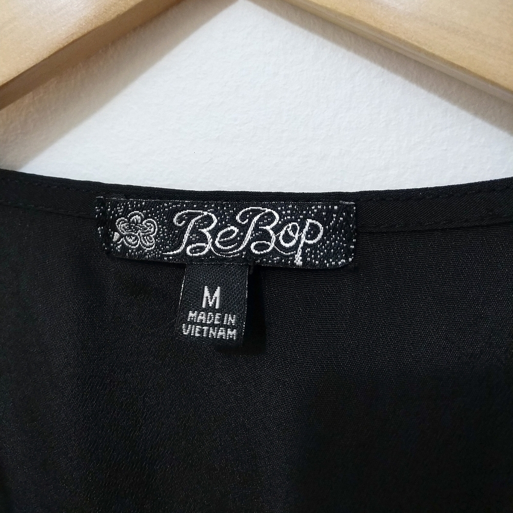 BeBop All Black Sleeveless Ruffle Bow Dress with Drawstring & Pockets (Medium) - Picture 3 of 8